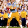 Troy Aikman Autographed/Signed UCLA Bruins 8x10 NCAA Photo "In The Pocket"-0