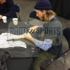 Norman Reedus & Austin Amelio Signed Walking Dead Angel Wing Vest With "Dwight" Inscription -27312