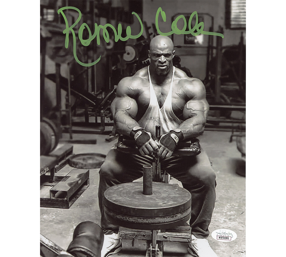 Ronnie Coleman Signed Sitting on Machine Unframed 8 x 10 Photo