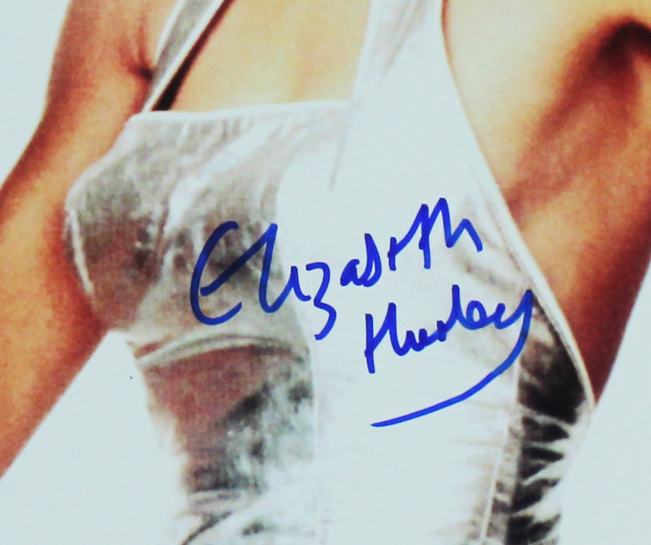 Elizabeth Hurley Signed Austin Powers Unframed 11x14 Holding Gun Photo - Image 2