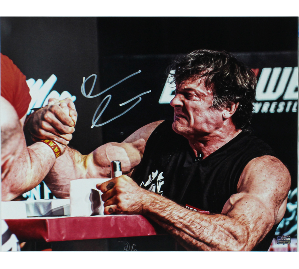 Devon Larratt Signed Unframed 16x20 Horizontal Arm Wrestling Photo - Black Sleeveless Shirt