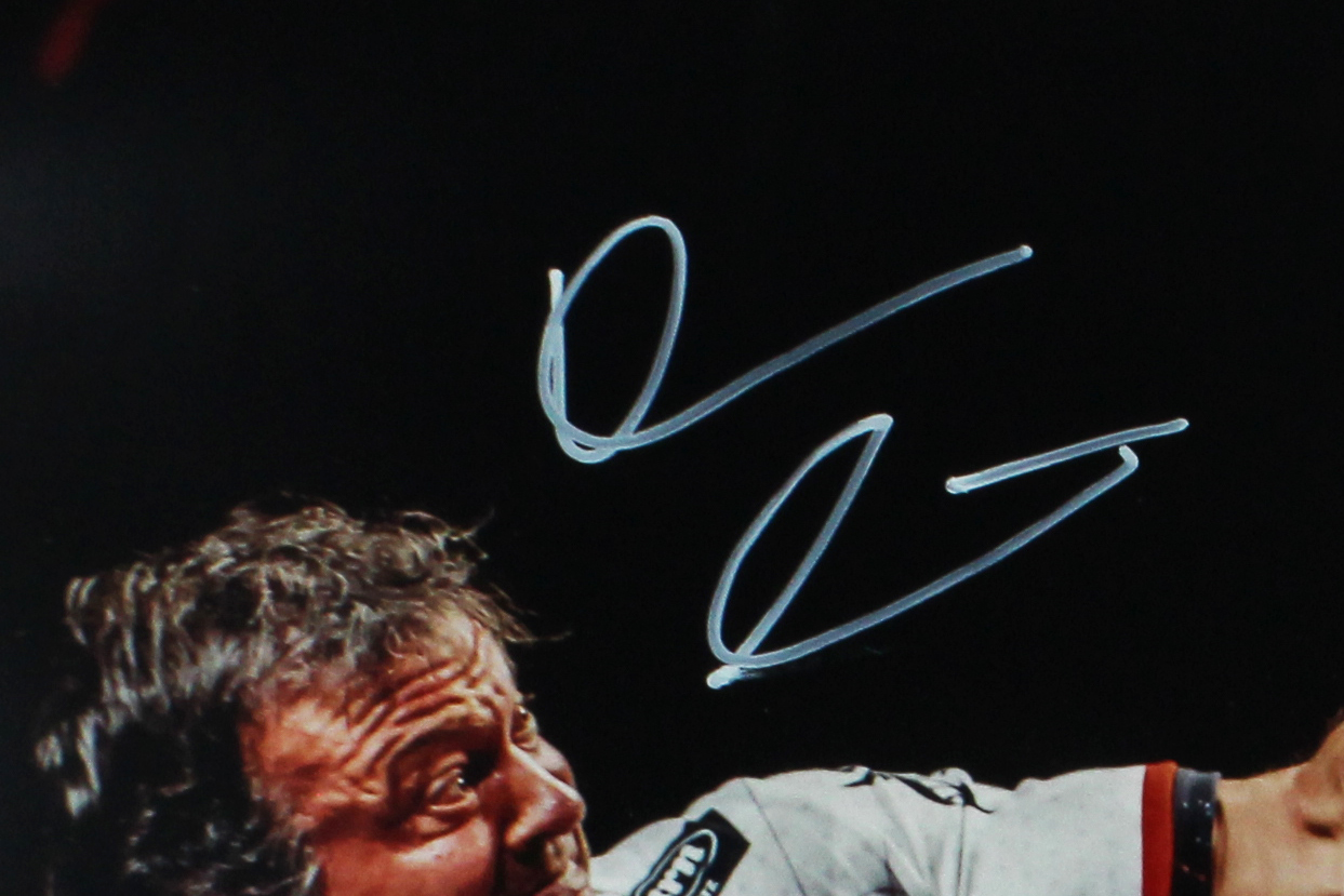 Devon Larratt Signed Unframed 16x20 Arm Wrestling Photo - White Shirt - Image 2