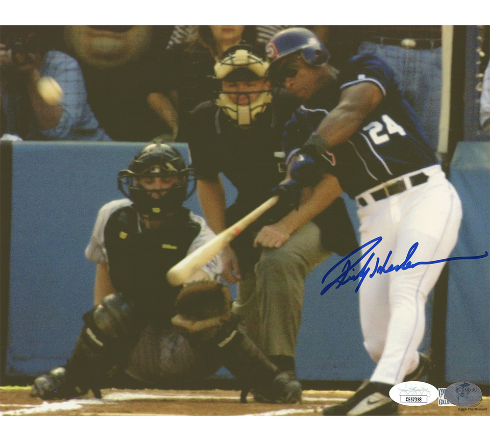 Rickey Henderson Signed San Diego Padres Unframed 8x10 Hitting Ball MLB Photo